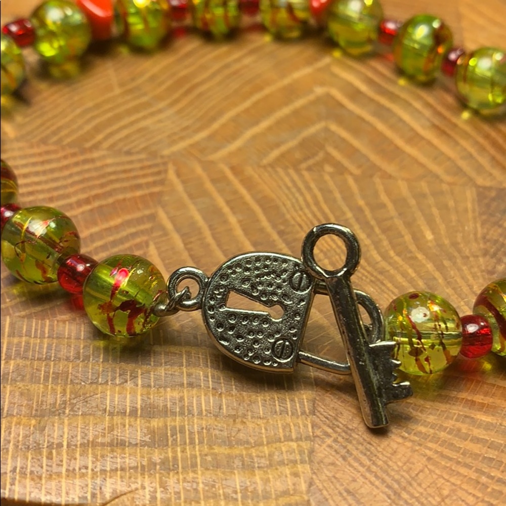 Key/lock red coral/Italian glass beads bracelet
